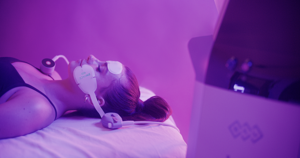 woman receiving emface treatment in wellington, fl